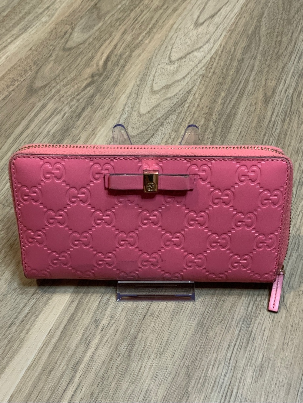 Gucci Pink Embossed GG Zip-Around Wallet with Bow